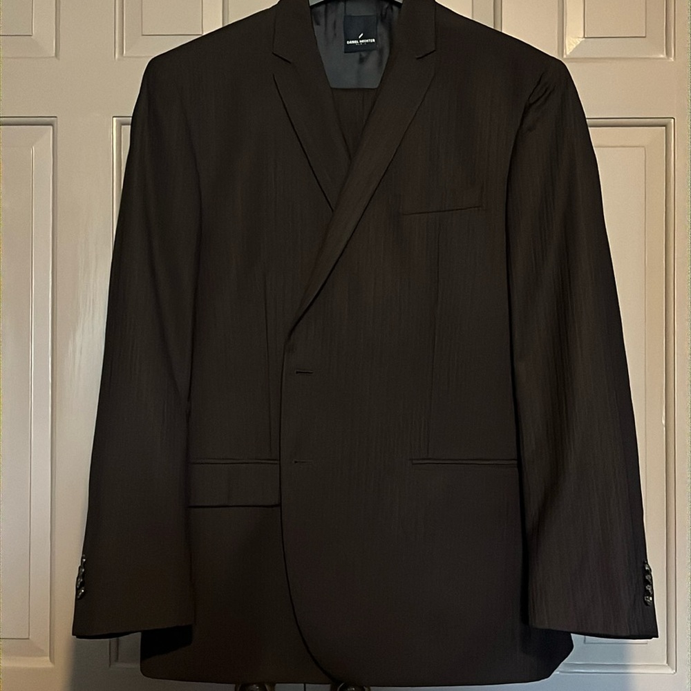 Daniel Hechter 2 button suit. 50 coat 45 pant. Dark brown w/ blue pinstripe